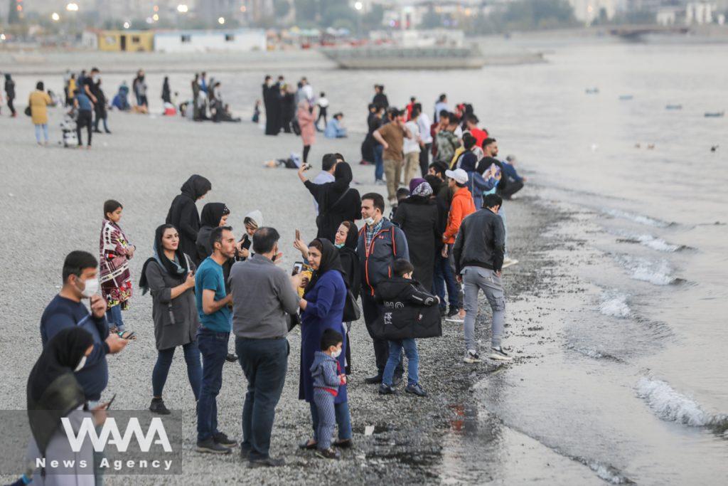 Some of Iranians,is seen after recording the statistics of coronavirus in Iran exceeded 5,500 daily cases and more than 300 deaths a day, in a promenade called Chitgar Lake, (COVID19), in the west of Tehran, Iran October 23, 2020. Picture taken October 23, 2020. Majid Asgaripour/WANA (West Asia News Agency)