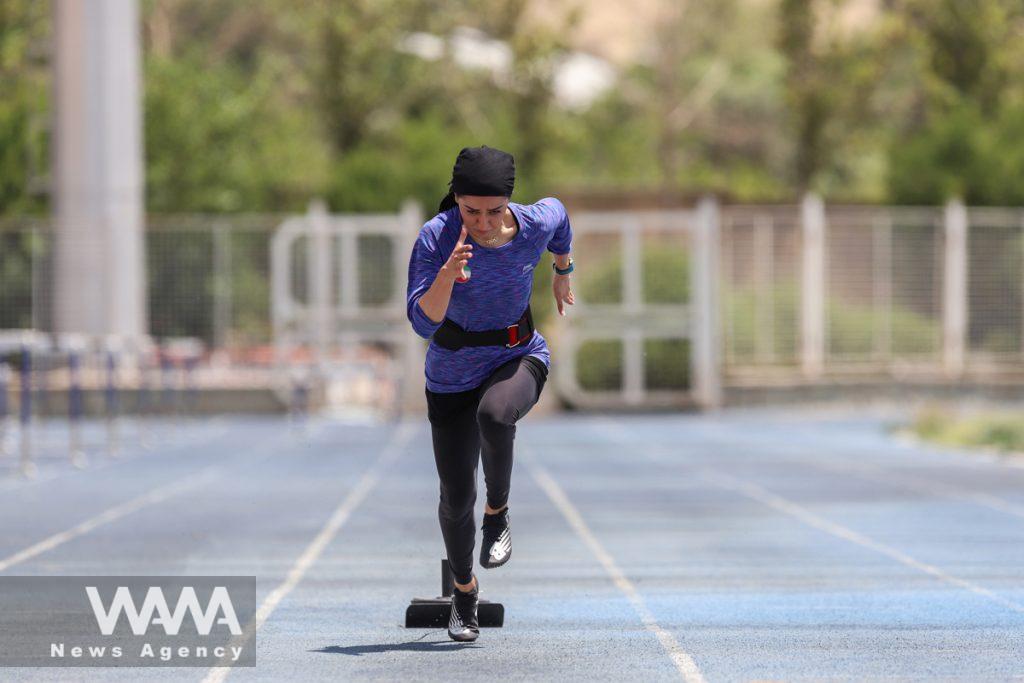 Farzaneh Fasihi, an Iranian sprinter at the Tokyo Olympics, is training at a stadium in Tehran, Iran July 2, 2021. Majid Asgaripour/WANA (West Asia News Agency)