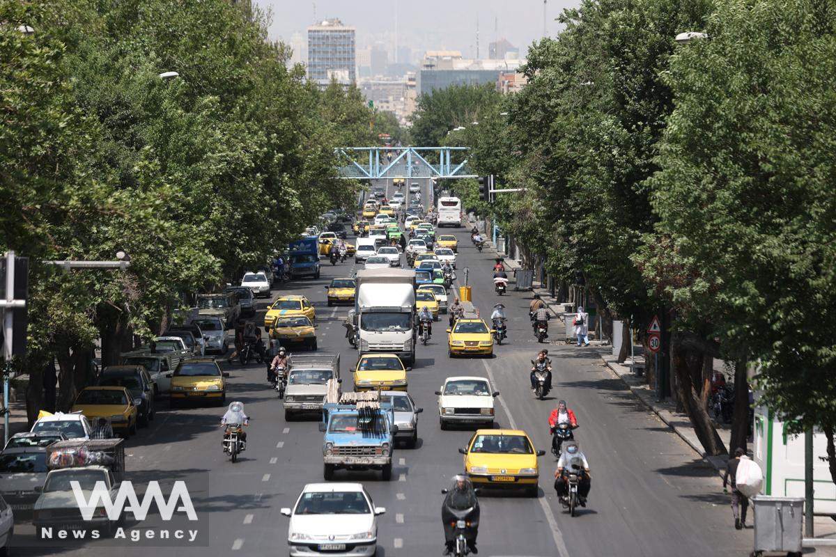Cars drive along a street in Tehran, Iran May 1, 2022. Majid Asgaripour/WANA (West Asia News Agency)
