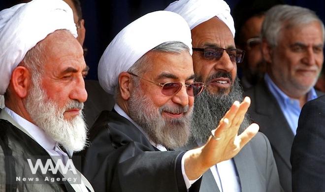 Maulvi Abdul Hamid next to the former president of Iran, Hassan Rouhani - Social Media / WANA News Agency