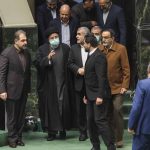 Iranian President Ebrahim Raisi greets lawmakers as he arrives during the parliament session in Tehran, Iran, January 11, 2023. Majid Asgaripour/WANA (West Asia News Agency)