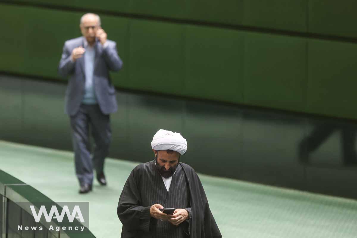 A member of parliament attends parliament meeting in Tehran, Iran, January 22, 2023. Majid Asgaripour/WANA (West Asia News Agency)