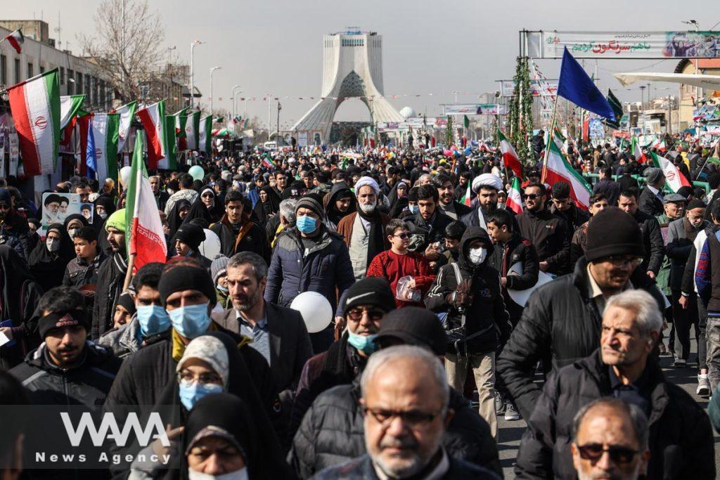 Iranians attend the 44th anniversary of the Islamic Revolution in Tehran, Iran, February 11, 2023. Majid Asgaripour/WANA (West Asia News Agency)
