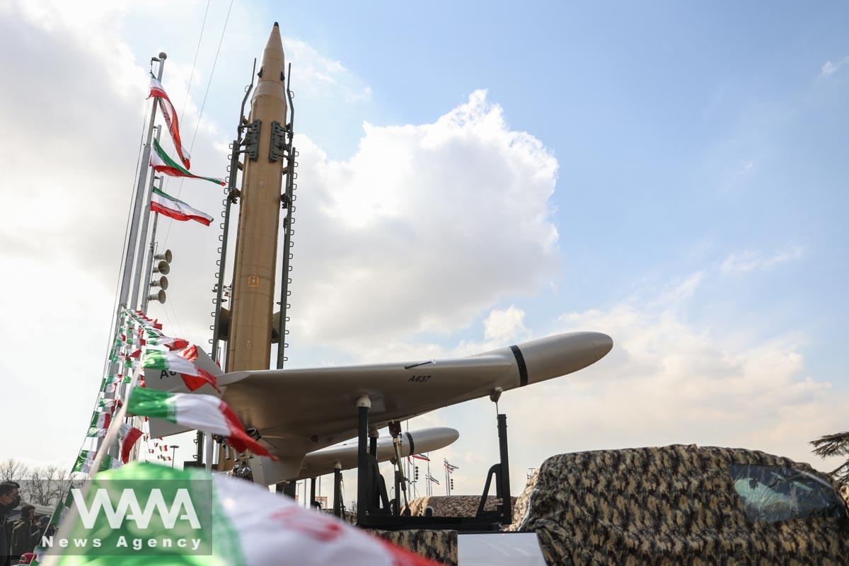 A drone is seen next to an Iranian missile during the 44th anniversary of the Islamic Revolution in Tehran, Iran, February 11, 2023. Majid Asgaripour/WANA (West Asia News Agency)