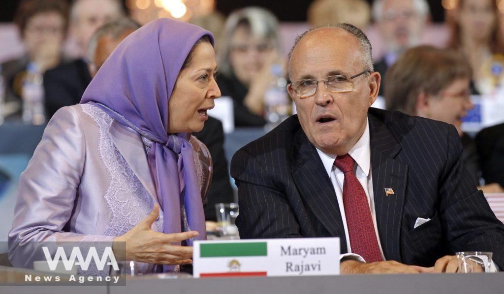 Maryam Rajavi and former mayor of New York Rudy Giuliani take part in a rally in Villepinte, near Paris June 18, 2011. REUTERS/Benoit Tessier / / WANA News Agency