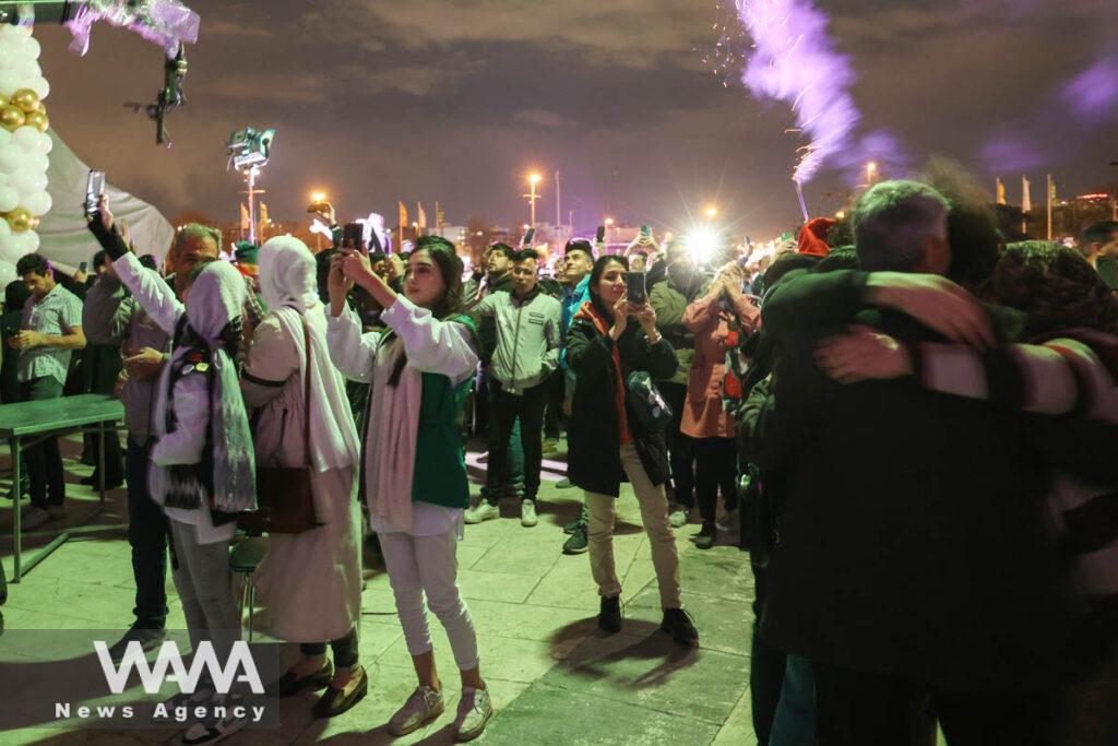 Iranians celebrate Nowruz next to the Azadi Tower in Tehran /WANA (West Asia News Agency)