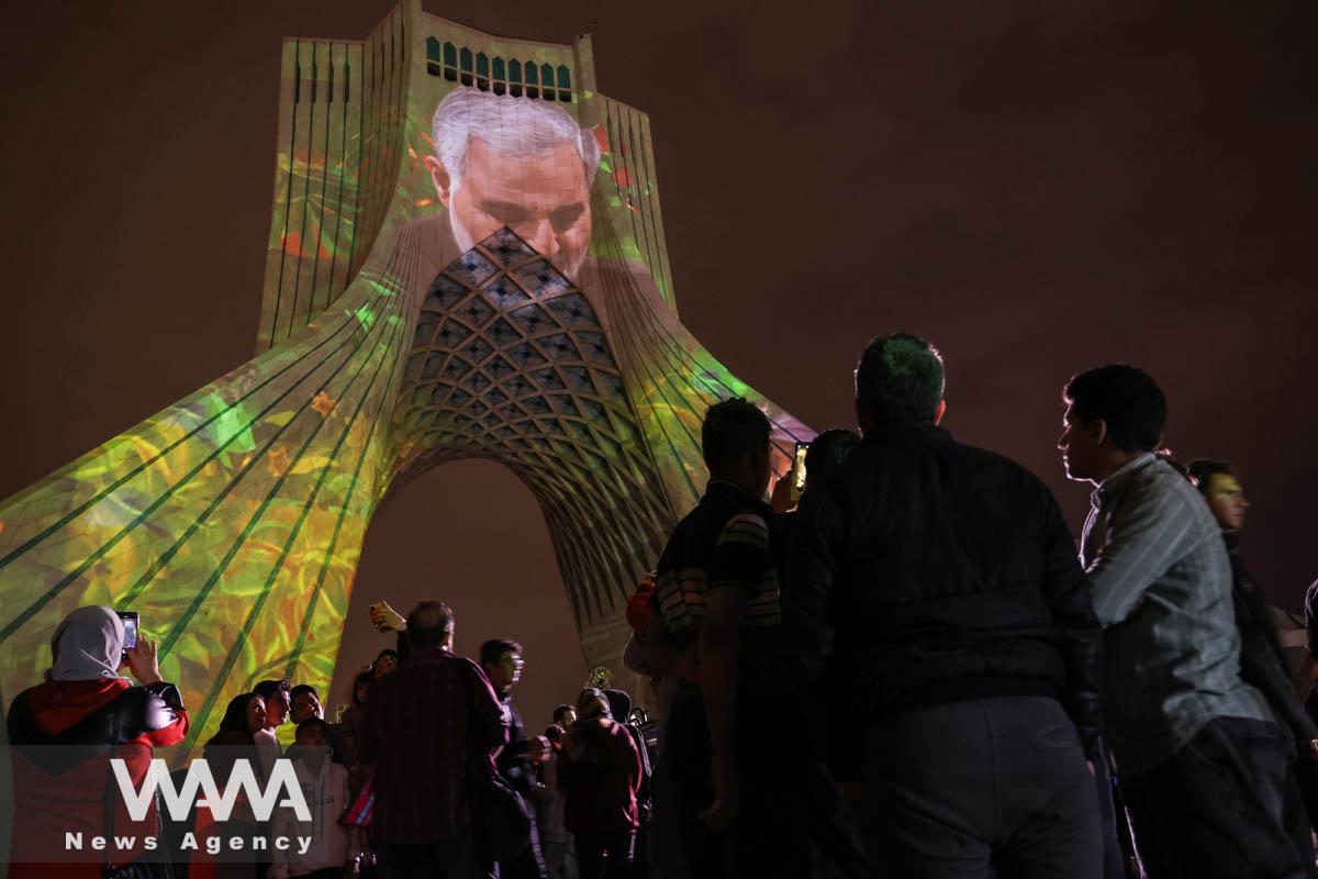 The late Iranian Major-General Qassem Soleimani's image is projected on the Azadi tower during a video mapping light show to celebrate the Iranian New Year Nowruz in Tehran, Iran March 21, 2023. Majid Asgaripour/WANA (West Asia News Agency)