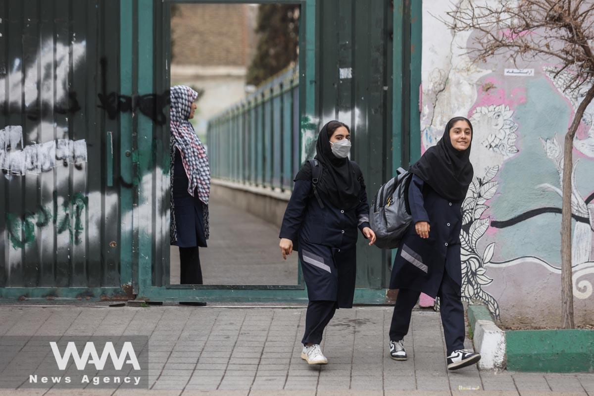 Iranian female students leave a school in Tehran, Iran, March 7, 2023. Majid Asgaripour/WANA (West Asia News Agency)