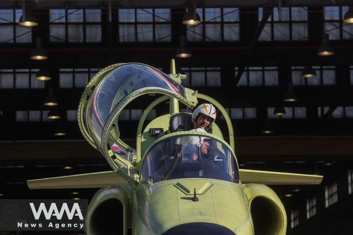 Pilots sit in the Yasin training jet during its unveiling ceremony in Tehran, Iran, March 11, 2023. Majid Asgaripour/WANA (West Asia News Agency)