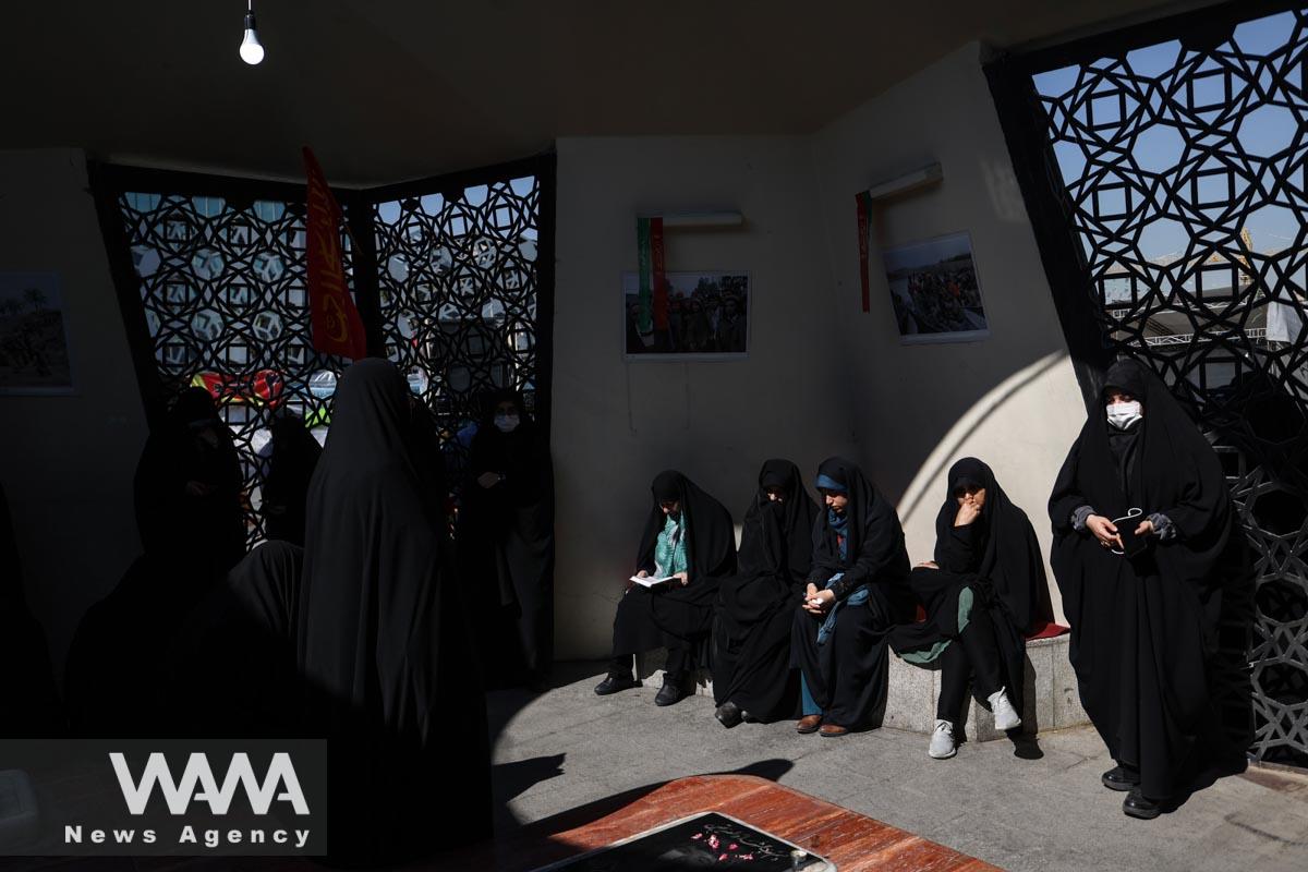 Iranian women gather during the funeral ceremony of Milad Heydari and Meghdad Mahghani, members of Iran's Islamic Revolution Guards Corps (IRGC) who were killed in an Israeli airstrike on Damascus, held in Tehran, Iran, April 4, 2023. Majid Asgaripour/WANA (West Asia News Agency)