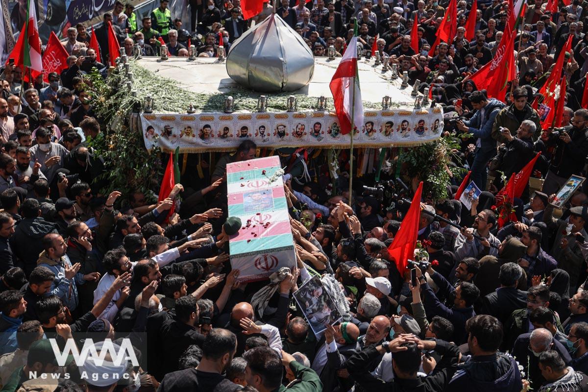 People carry the coffin of Milad Heydari a member of Iran's Islamic Revolution Guards Corps (IRGC) who was killed in an Israeli airstrike on Damascus, held in Tehran, Iran, April 4, 2023. Majid Asgaripour/WANA (West Asia News Agency)