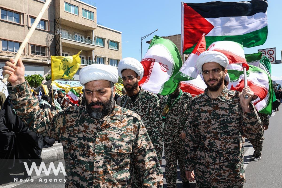 Iranian clerics hold flags during a rally marking the annual Quds Day, or Jerusalem Day, on the last Friday of the holy month of Ramadan in Tehran, Iran April 14, 2023. Majid Asgaripour/WANA (West Asia News Agency)