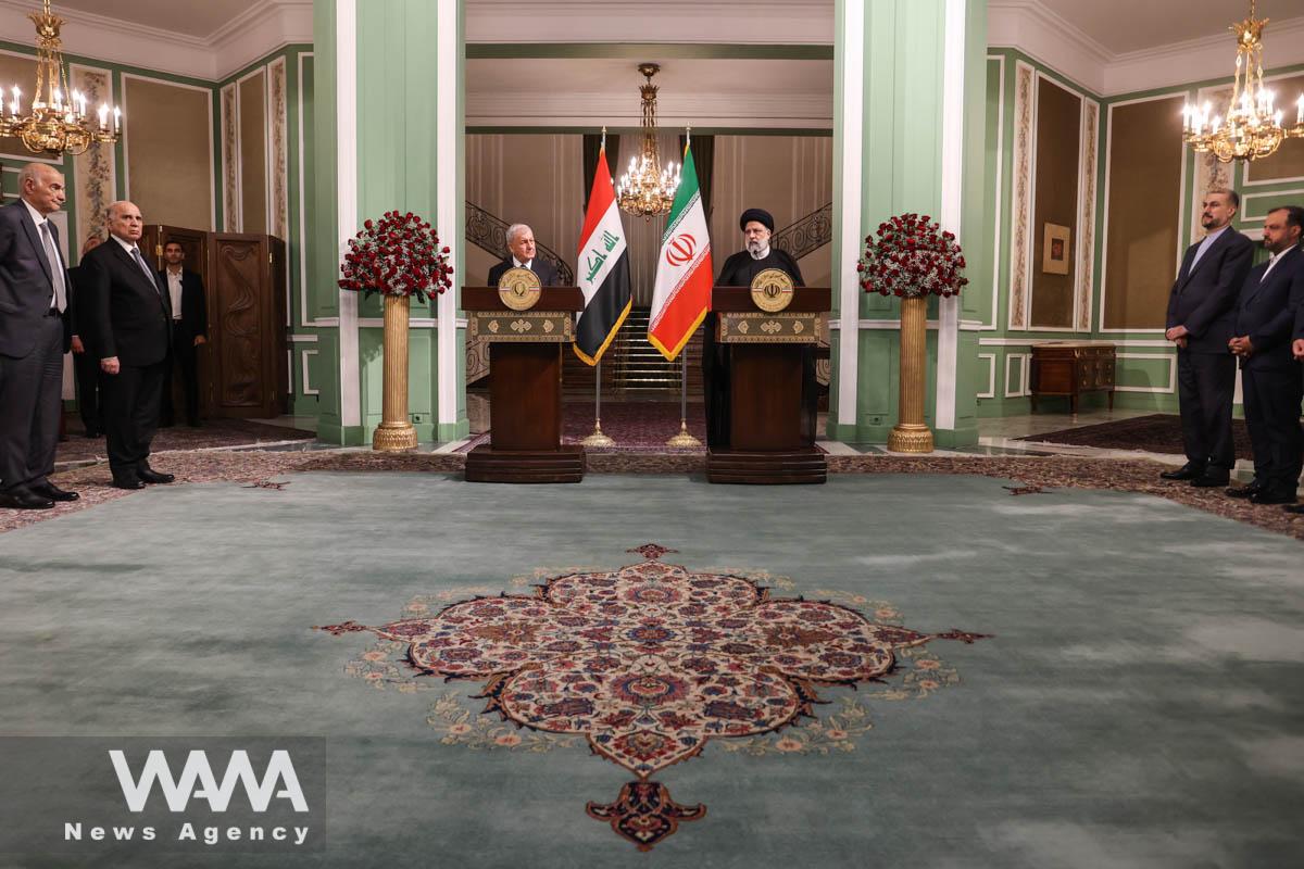 Iranian President Ebrahim Raisi and Iraqi President Abdul Latif Rashid attend a news conference in Tehran, Iran, April 29, 2023. Majid Asgaripour/WANA (West Asia News Agency)