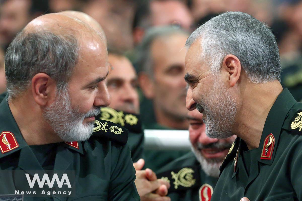 Iran's new Secretary of the Supreme National Security Council Ali Akbar Ahmadian is seen next to the late Iranian Major-General Qasem Soleimani during a meeting in Tehran, Iran, in this picture obtained on May 22, 2023. Office of the Iranian Supreme Leader/WANA (West Asia News Agency)