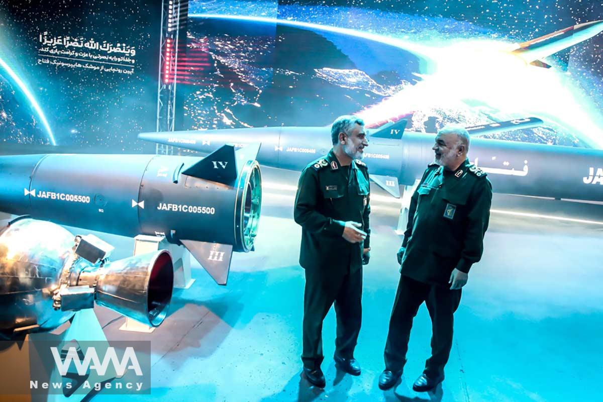 Commander-in-Chief of the Islamic Revolution Guards Corps (IRGC) Hossein Salami and IRGC Aerospace Force Commander Amir Ali Hajizadeh stand next to the new hypersonic ballistic missile called "Fattah" with a range of 1400 km during an unveiling ceremony in Tehran, Iran, June 6, 2023. IRGC/WANA (West Asia News Agency)