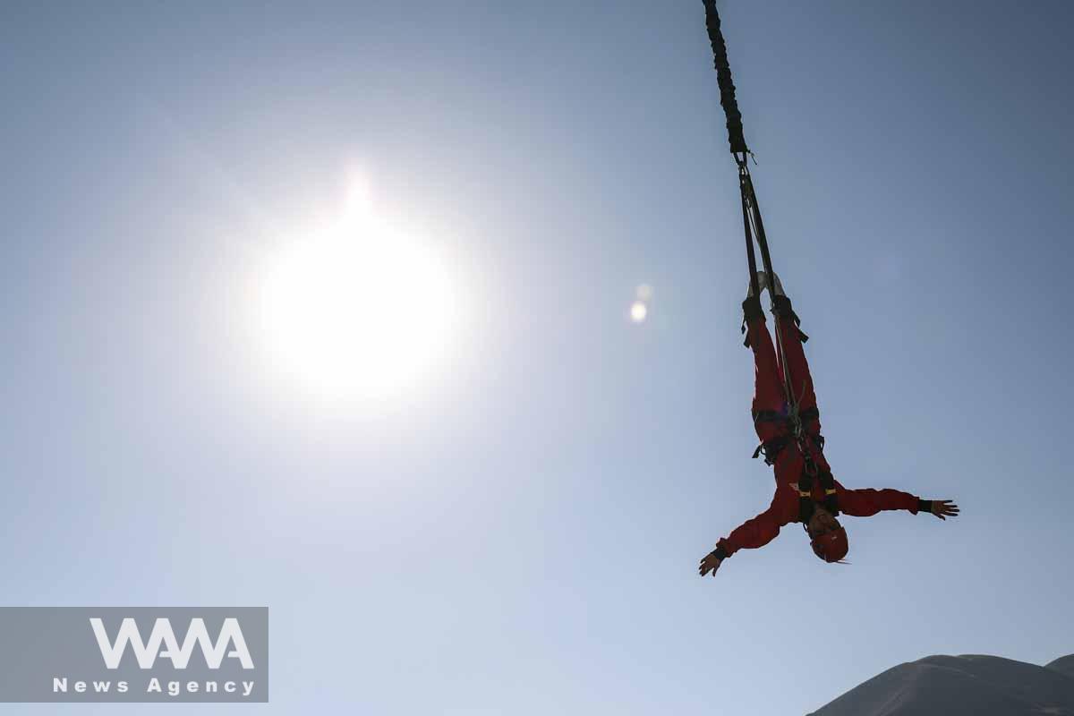 An Iranian female Sogand Salari makes a bungee jump, at Adrenaline Park in Tehran, Iran June 21, 2023. Majid Asgaripour/WANA (West Asia News Agency)