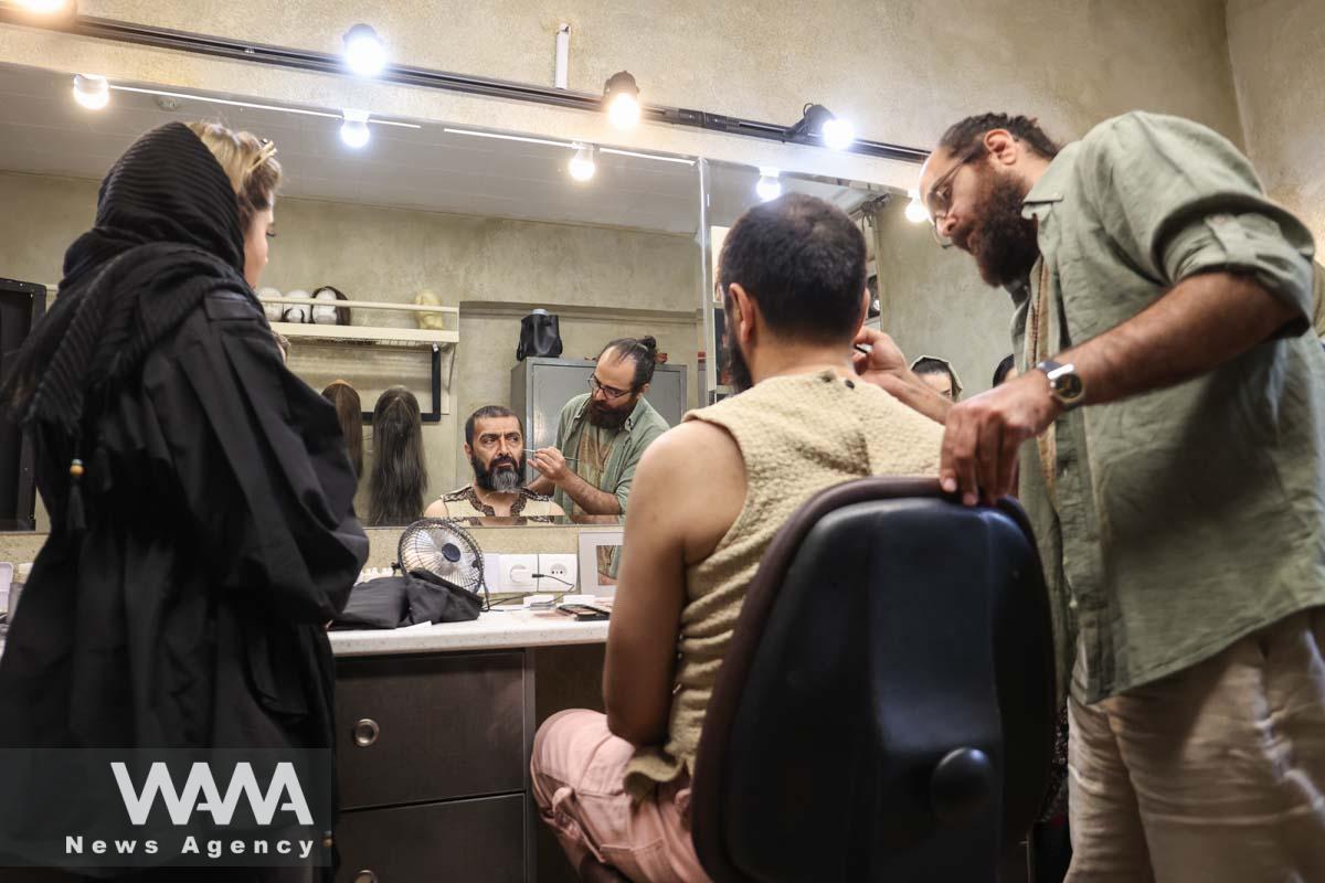 Iranian actor Amin Zendegani gets his makeup done backstage before performing in the 'Haft-Khan Esfandiar' musical theater production at the Vahdat Hall in Tehran, Iran, 27 June 2023. Majid Asgaripour/WANA (West Asia News Agency)