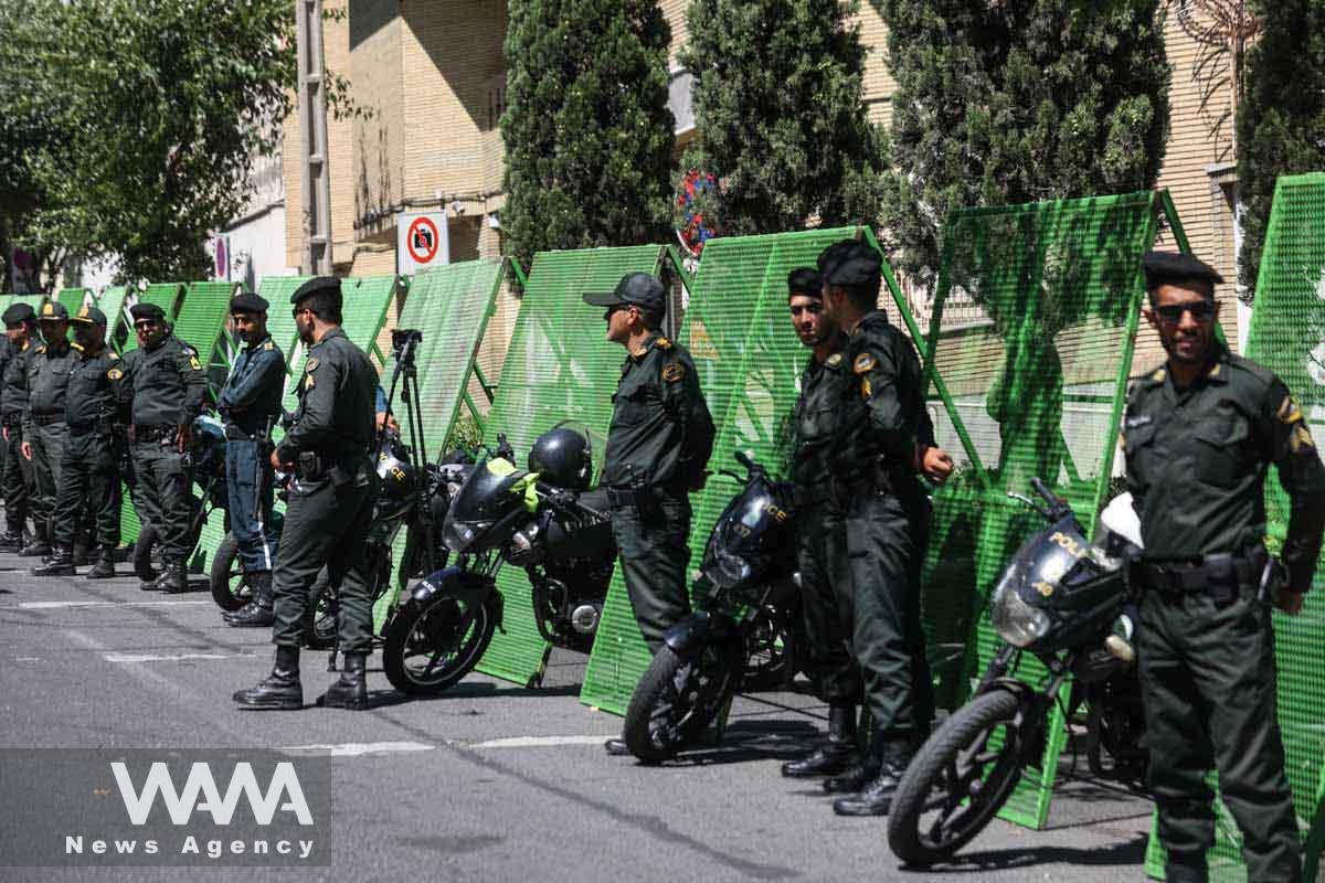 Police stand guard outside the French embassy during a protest against a man who burned a copy of the Quran outside a mosque in the Swedish capital Stockholm, in front of the Swedish Embassy in Tehran, Iran June 30, 2023. Majid Asgaripour/WANA (West Asia News Agency)