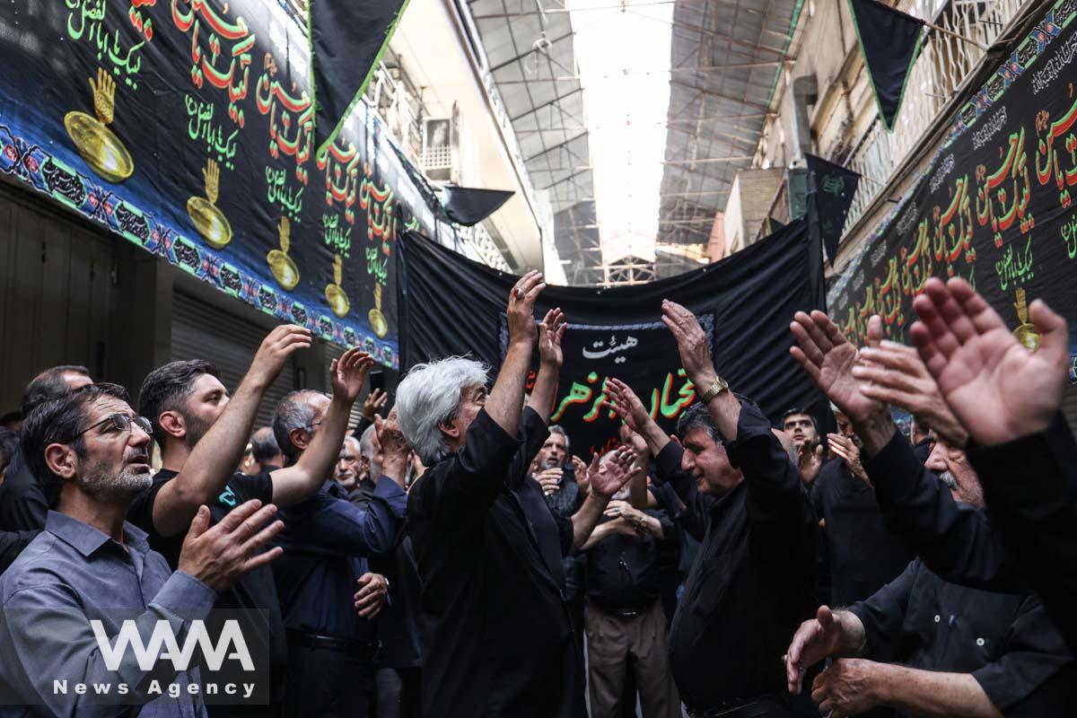 Iranian Shi'ite Muslims take part in a mourning ritual ahead of Ashura, the holiest day on the Shi'ite Muslim calendar in Tehran, Iran July 27, 2023. Majid Asgaripour/WANA (West Asia News Agency)