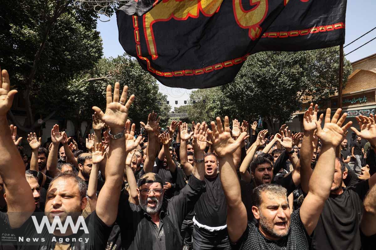 Iranian Shi'ite Muslims mourn during a ceremony to mark Ashura, the holiest day on the Shi'ite Muslim calendar, in Tehran, Iran July 28, 2023. Majid Asgaripour/WANA (West Asia News Agency)