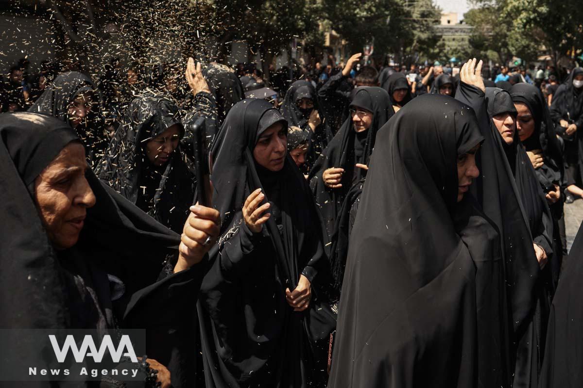 Iranian women mourn during a ceremony to mark Ashura, the holiest day on the Shi'ite Muslim calendar, in Tehran, Iran July 28, 2023. Majid Asgaripour/WANA (West Asia News Agency)