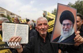 An Iranian protester holds the Koran in his hand, during a protest against the insult to the Koran in Stockholm, in Tehran, Iran July 21, 2023. Majid Asgaripour/WANA (West Asia News Agency)