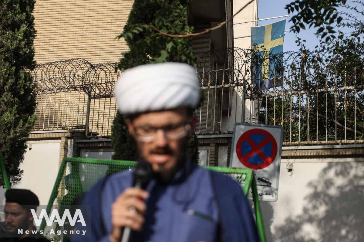 The Swedish flag is seen on the Swedish Embassy building during a protest against the insult to the Koran in Stockholm, in front of the Swedish Embassy in Tehran, Iran July 21, 2023. Majid Asgaripour/WANA (West Asia News Agency)