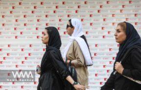 Iranian women walk on a street during the revival of morality police in Tehran, Iran, July 16, 2023. Majid Asgaripour/WANA (West Asia News Agency)