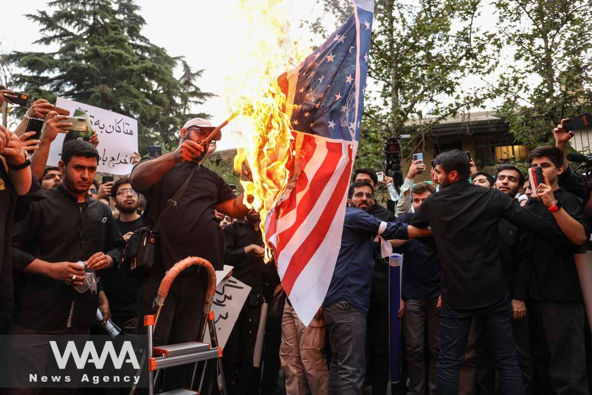 Demonstrators burn the U.S. flag during a protest against the insult to the Koran in Stockholm, in front of the Swedish Embassy in Tehran, Iran July 21, 2023. Majid Asgaripour/WANA (West Asia News Agency)