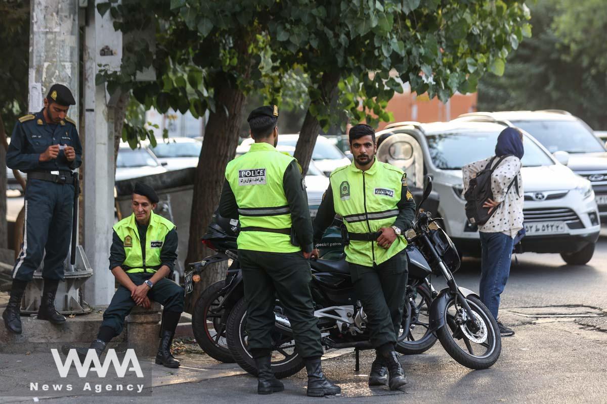 Iran's police forces stand on a street during the revival of morality police in Tehran, Iran, July 16, 2023. Majid Asgaripour/WANA (West Asia News Agency)
