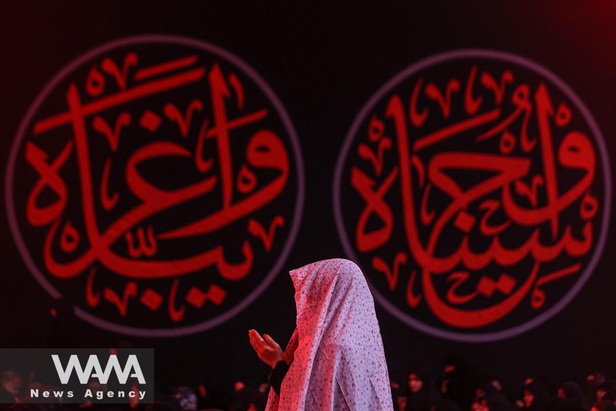 An Iranian Shi'ite woman takes part in a mourning ritual ahead of Ashura, the holiest day on the Shi'ite Muslim calendar in Tehran, Iran July 26, 2023. Majid Asgaripour/WANA (West Asia News Agency)