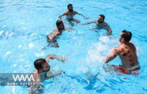 Iranians swim in a pool during the heat surge in Tehran, Iran August 3, 2023. Majid Asgaripour/WANA (West Asia News Agency)
