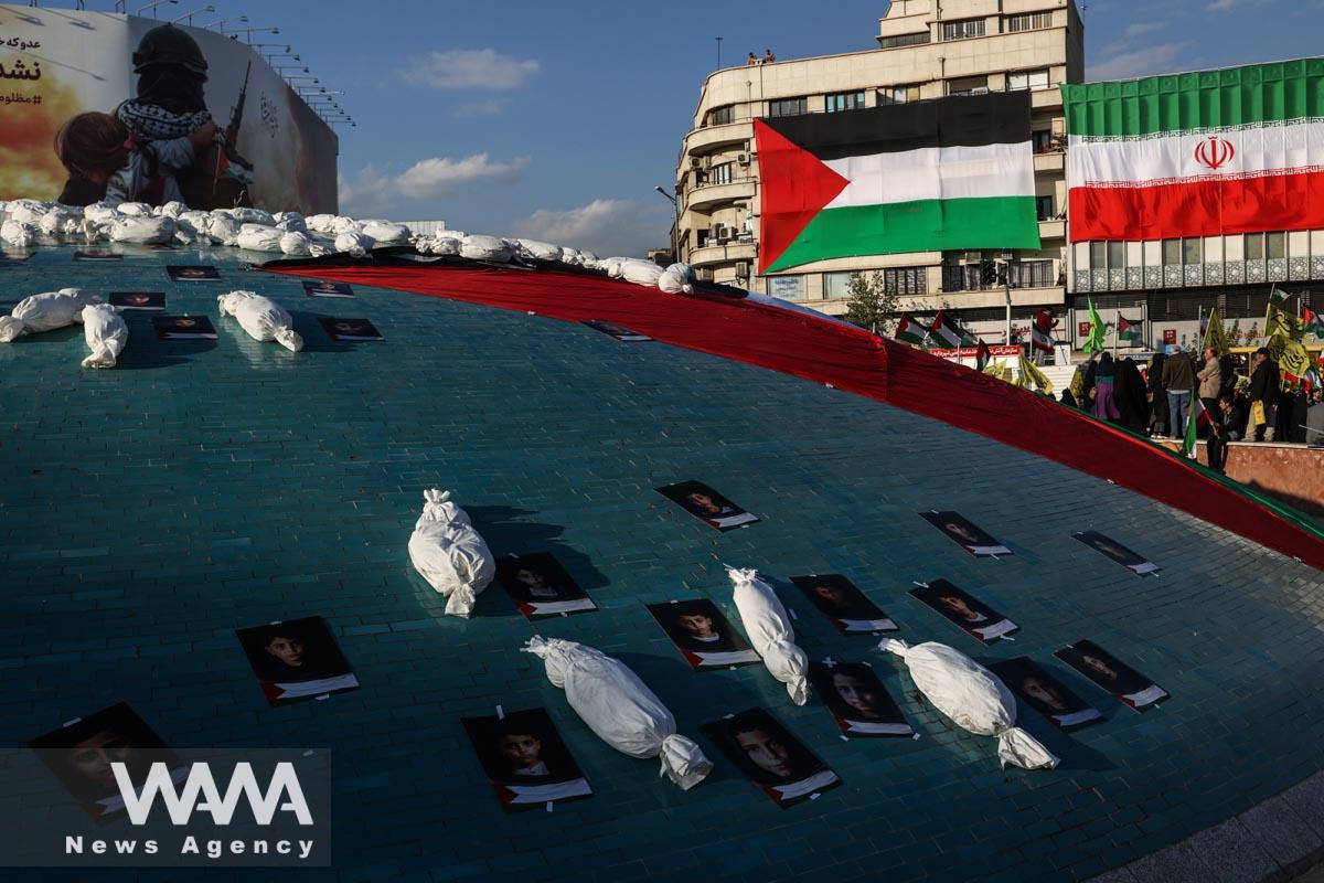 Symbolic shrouds of Gaza children's dead bodies are seen during an anti-Israel protest in Tehran/WANA (West Asia News Agency)