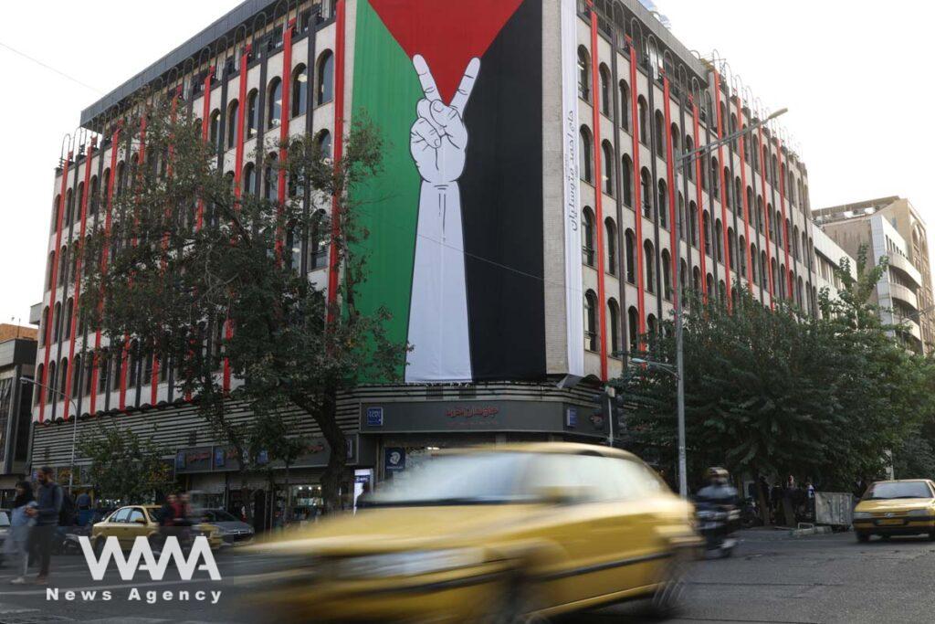 A huge Palestinian flag is seen on a building in a street in Tehran/WANA (West Asia News Agency)
