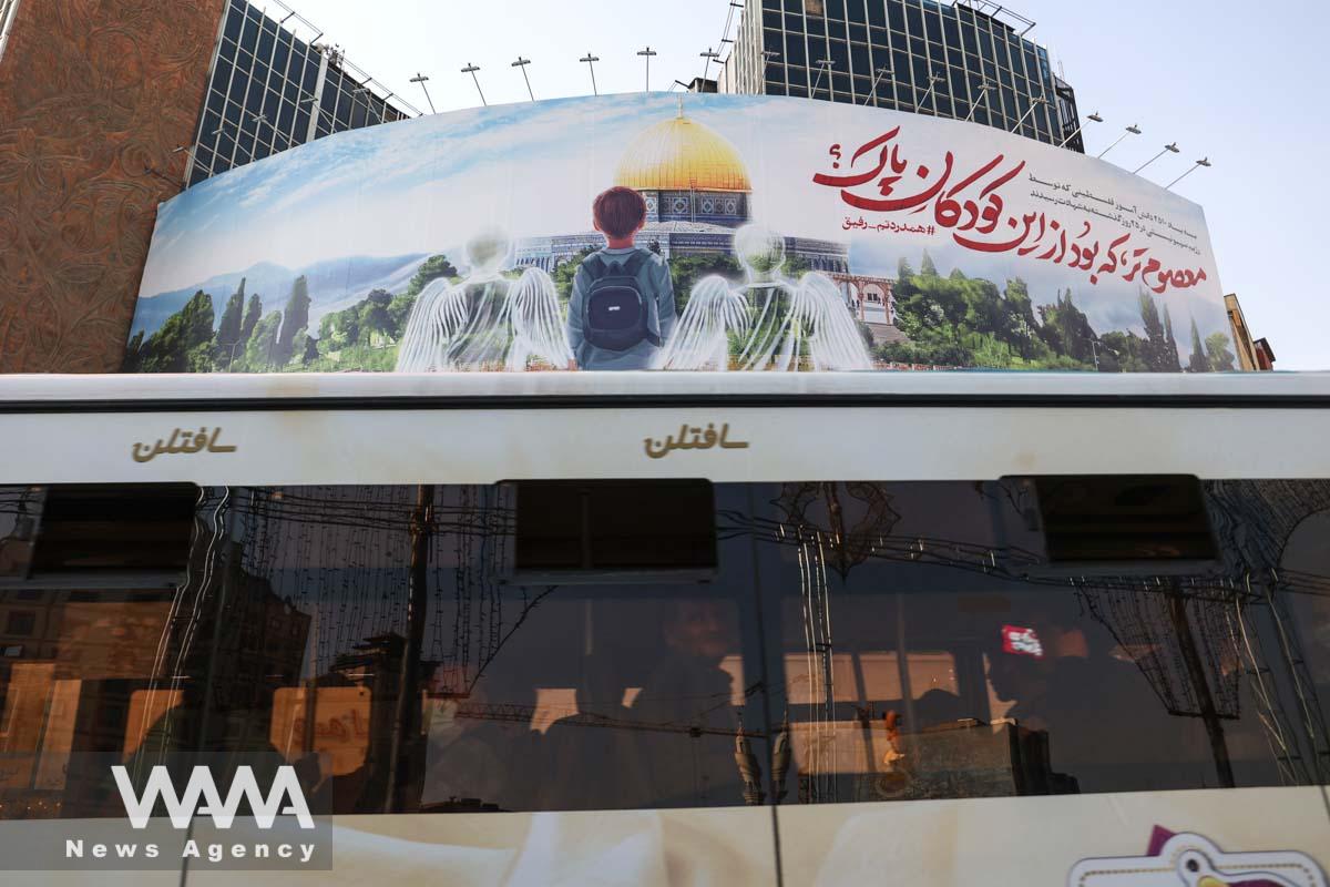 A pro-Palestine billboard is seen in a street in Iran/