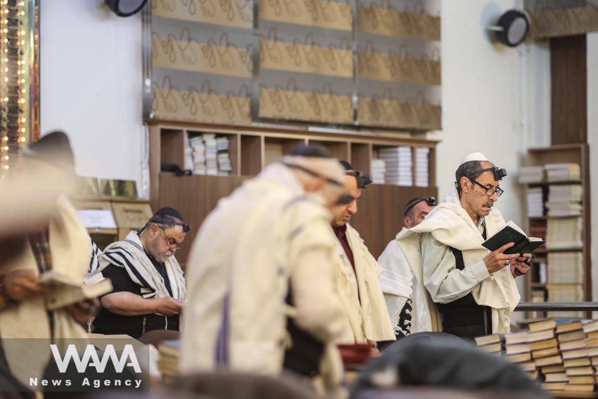 Iranian Jews attend a Jewish worship service in a synagogue/WANA (West Asia News Agency)