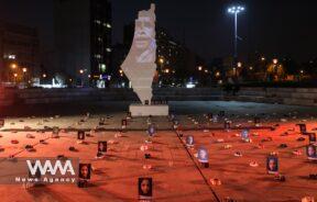 Symbolic shoes and pictures depicting deceased children in Gaza on display during a pro-Palestine campaign//WANA (West Asia News Agency)