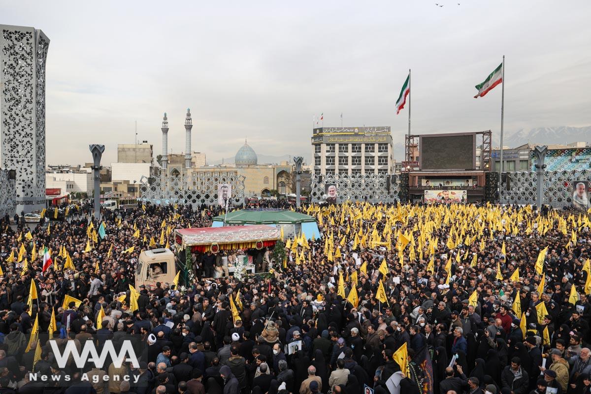 People gather for the funeral ceremony of senior adviser for Iran's Revolutionary Guards, Sayyed Razi Mousavi, who was killed in an Israeli air strike outside the Syrian capital Damascus