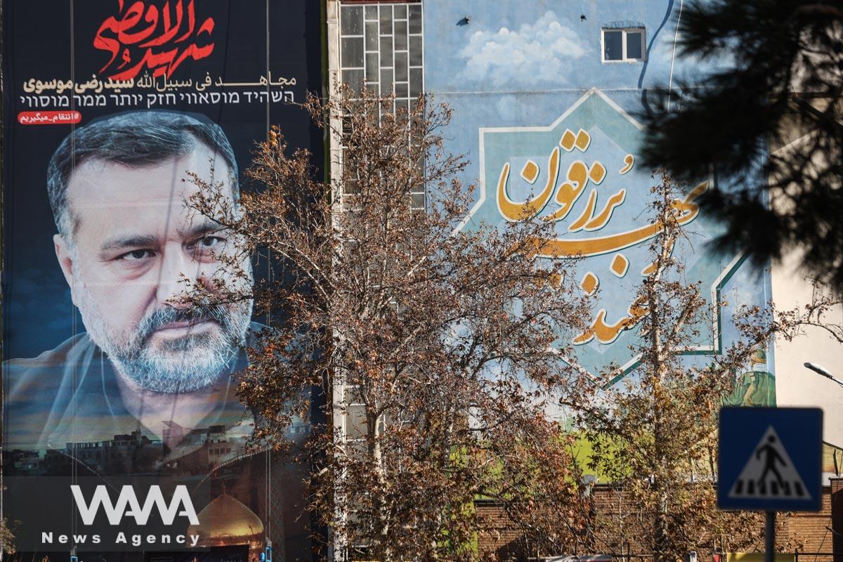 A billboard with a picture of the senior adviser for Iran's Revolutionary Guards, Sayyed Razi Mousavi is seen in a street/WANA (West Asia News Agency)