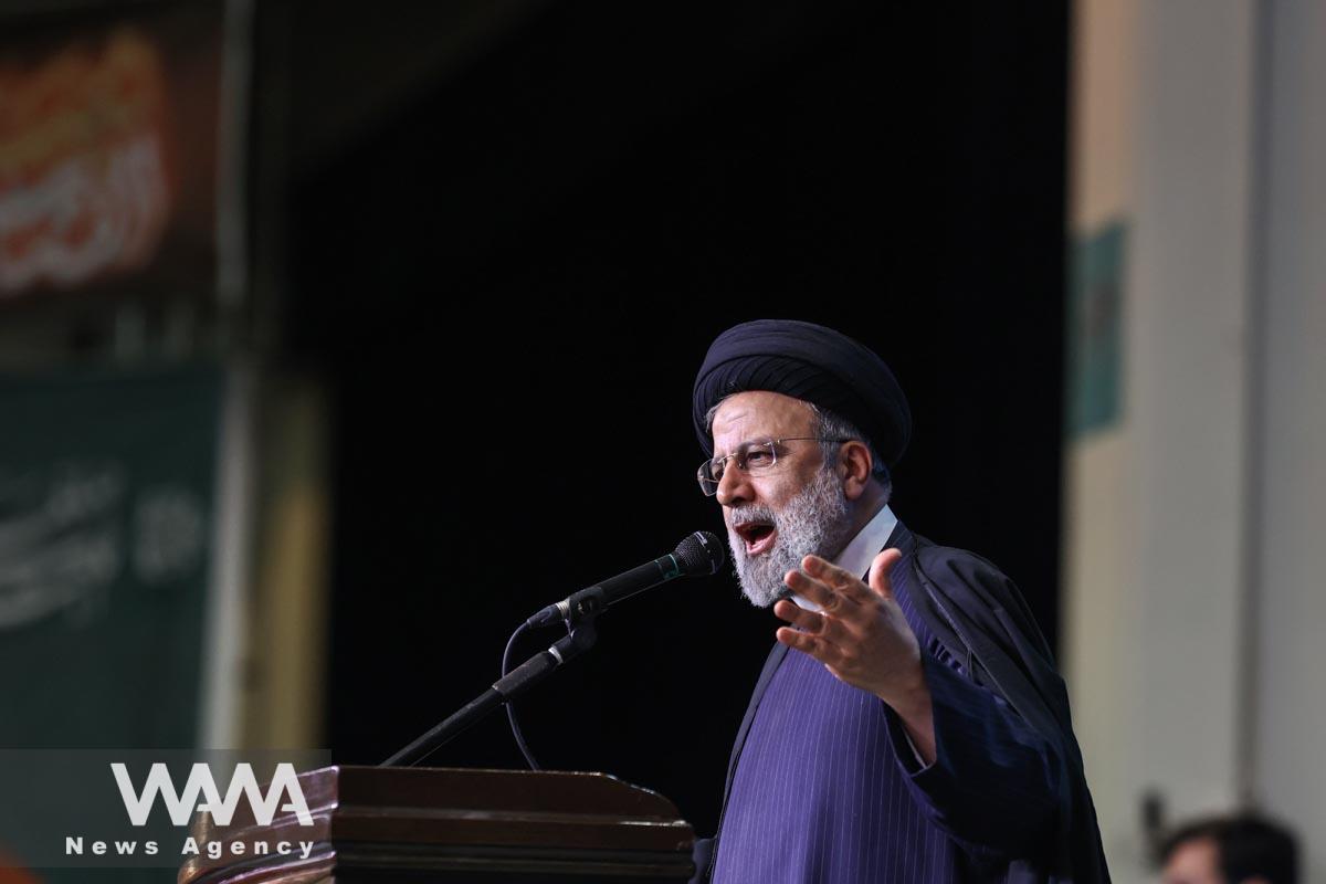 Iranian President Ebrahim Raisi gives a speech during a ceremony to mark the fourth anniversary of the killing of senior Iranian military commander General Qassem Soleimani in a U.S. attack