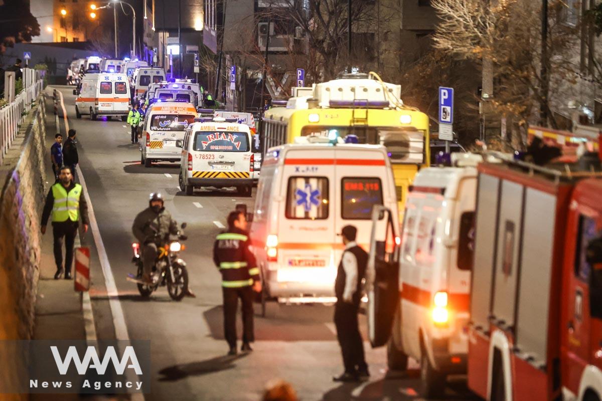 Ambulances are seen during the fire at a hospital