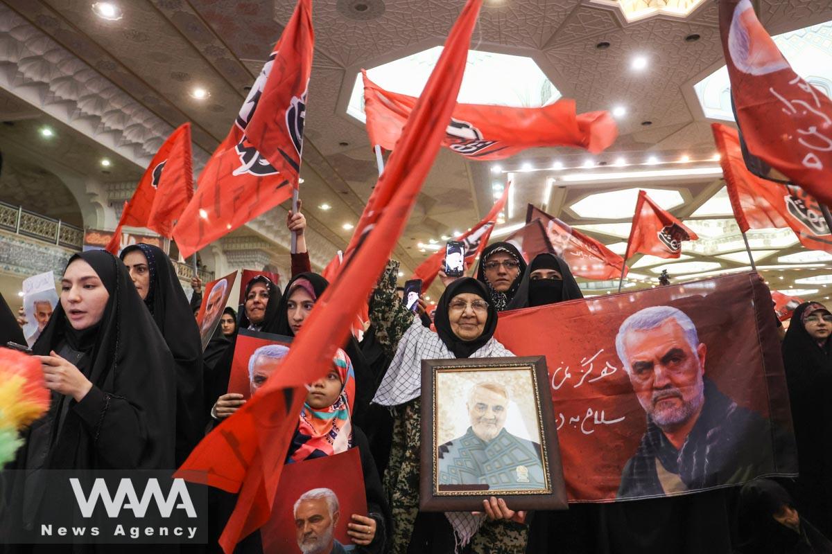 Iranian Women hold pictures of Qassem Soleimani, during a ceremony to mark the fourth anniversary of the killing of senior Iranian military commander General Qassem Soleimani in a U.S. attack
