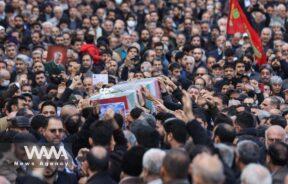 People carry the coffin of Faezeh Rahimi one of the casualties of the ISIS attack in Kerman during her funeral ceremony