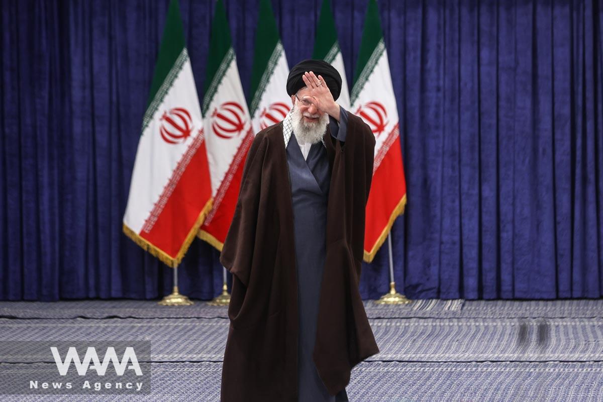 Iran's Supreme Leader Ayatollah Ali Khamenei gestures after he votes during parliamentary elections
