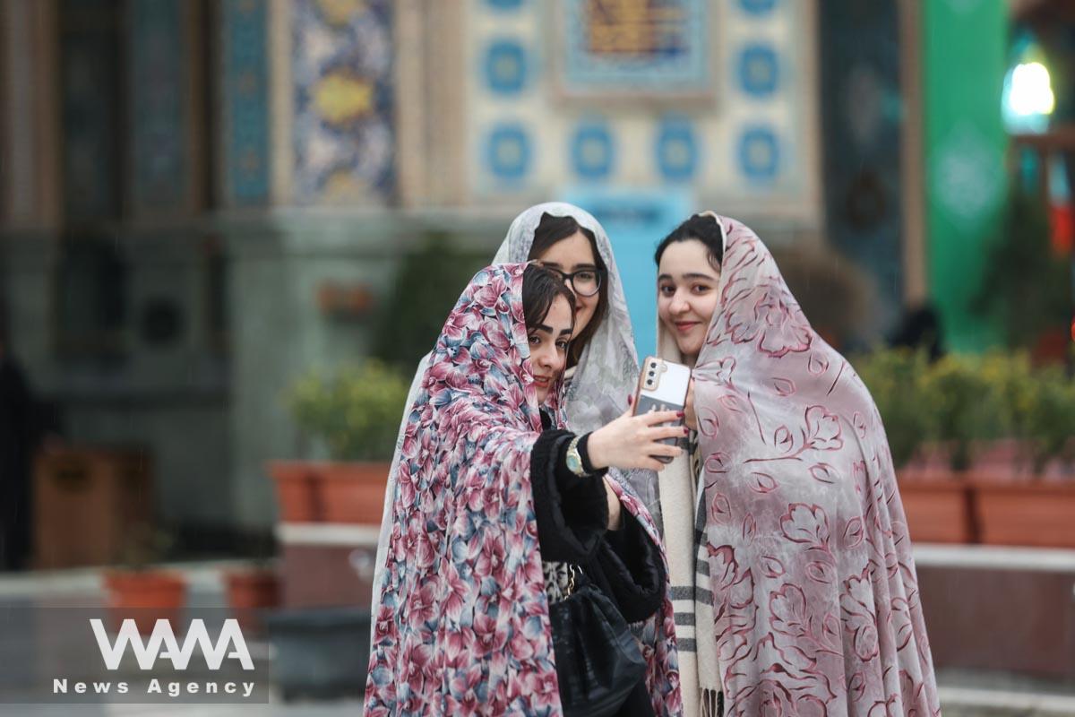 Iranian women take a selfie in the Imamzadeh Saleh shrine during the holy month of Ramadan in Tehran/WANA (West Asia News Agency)