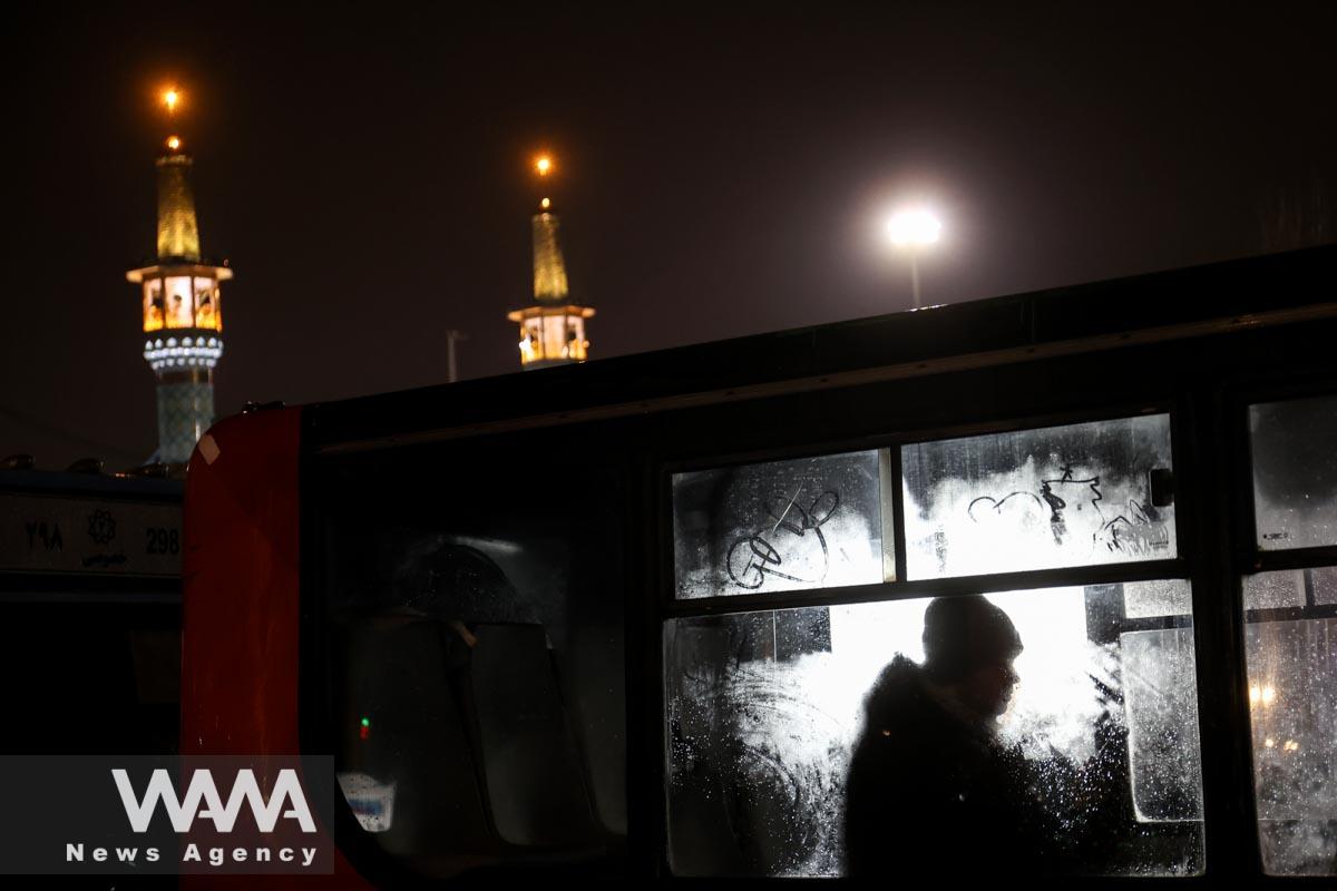 An Iranian man sits in a bus during the holy month of Ramadan in Tehran/WANA (West Asia News Agency)