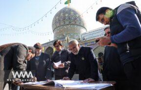 Iranians check the names of candidates during the parliamentary election at a polling station in Tehran, Iran, March 1, 2024. Majid Asgaripour/WANA (West Asia News Agency)