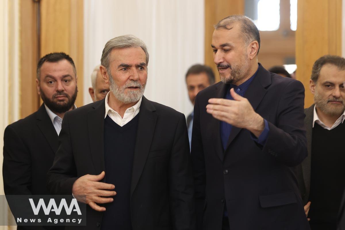 The Secretary-General of the Palestinian Islamic Jihad Movement, Ziyad Nakhaleh and Iran's Foreign Minister Hossein Amir Abdollahian attend a press conference