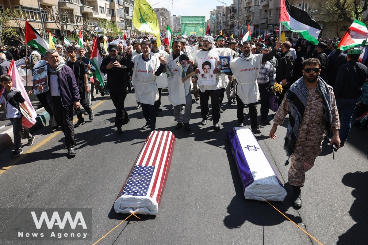 Iranians attend Quds Day and the funeral of members of the Islamic Revolutionary Guard Corps who were killed in the Israeli airstrike on the Iranian embassy complex in the Syrian capital Damascus