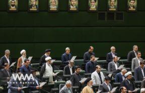 Members of Parliament swear oath during the opening ceremony of Iran's 12th parliament